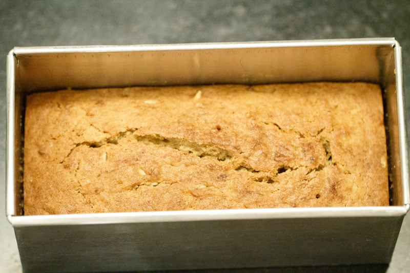 Top shot of baked banana bread in loaf baking pan