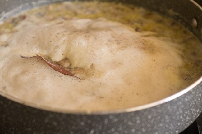 simmering mushroom soup in pot