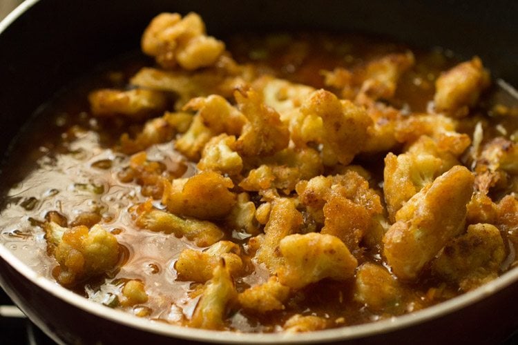 pan fried cauliflower florets added to sauce or gravy