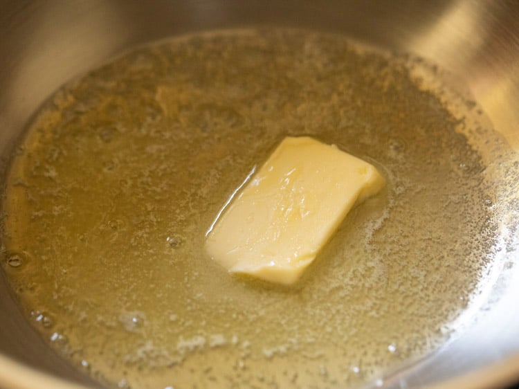 butter getting melted in a pan
