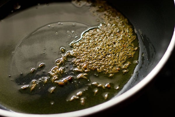 spices spluttering in oil